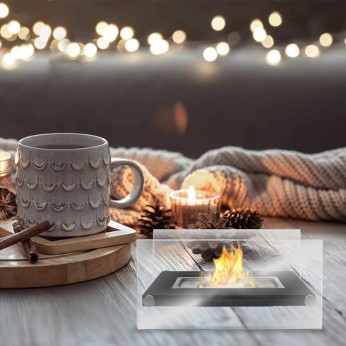 Szabadon álló asztali füstmentes biokandalló otthoni kertbe, fekete díszítő kövekkel