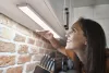 Kabinet alatti LED szalagfény 3.2W 200lm CCT alkonyati mozgásérzékelővel, elemes, szürke lineáris Ledvance