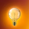 LED izzó E27 gömb alakú G95 3,1 W = 25 W 270 lm 1800 K Meleg CRI90 300° IZZÓFŰSZERES Vintage borostyánszínű, szabályozható fényerővel Dekoratív Philips