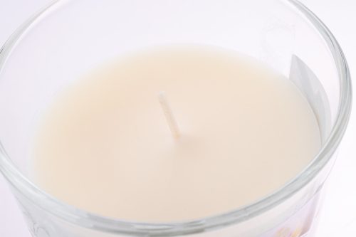 Dekoratív illatos gyertya vaníliás üvegben